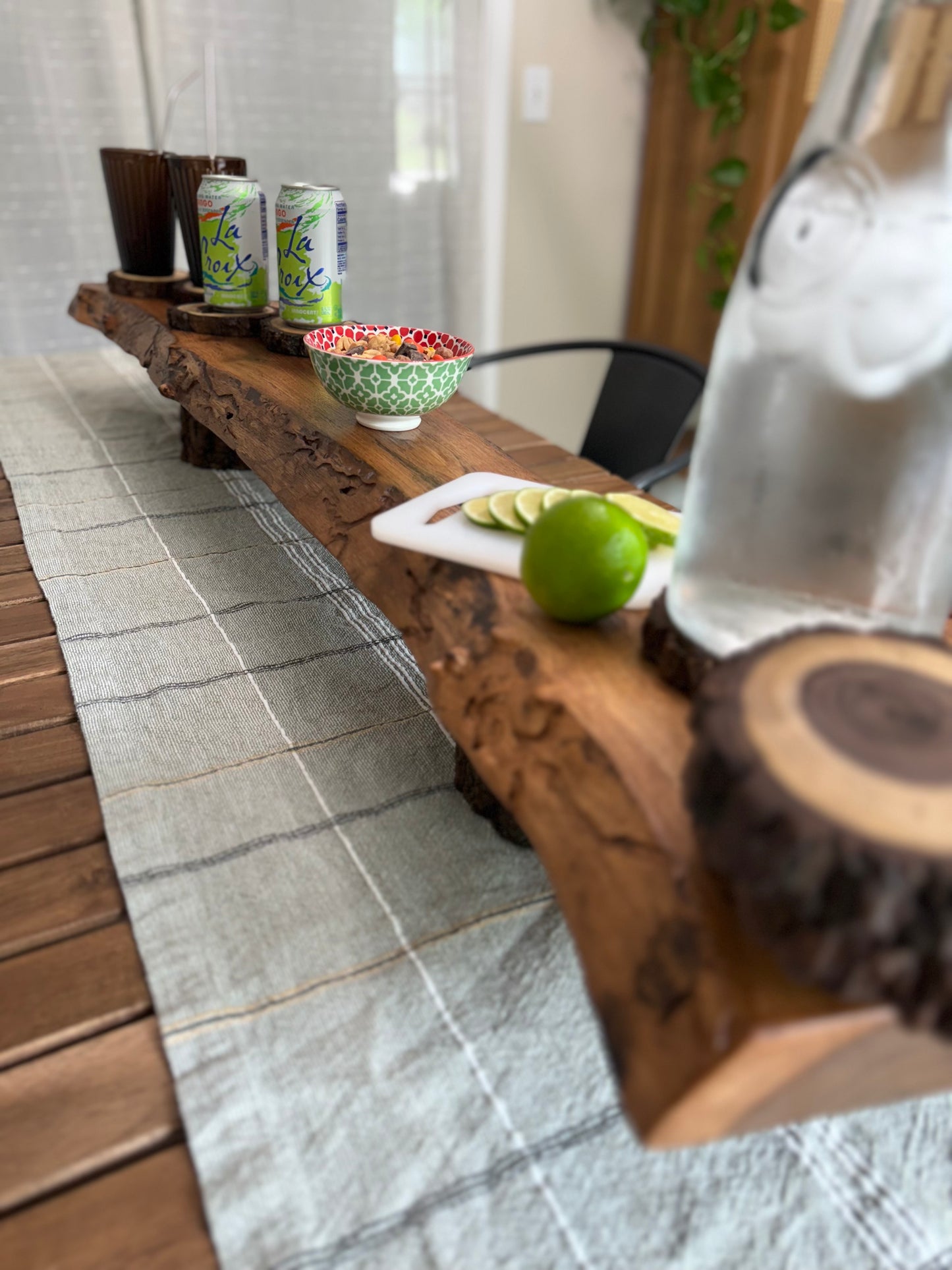 live edge charcuterie board styled with fruit and drinks