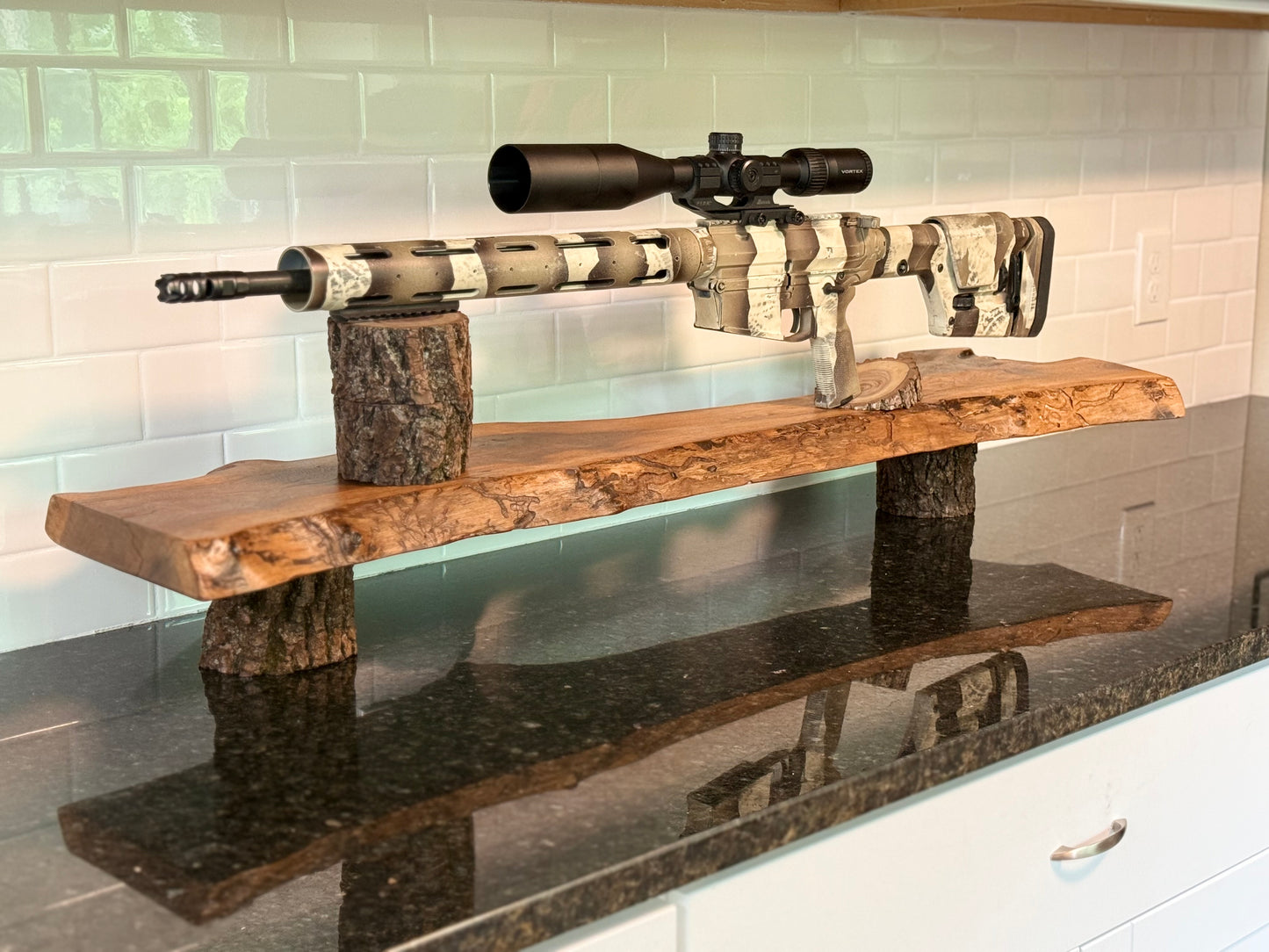 display firearm on handcrafted walnut slab shelf with natural bark, curves and grain patterns