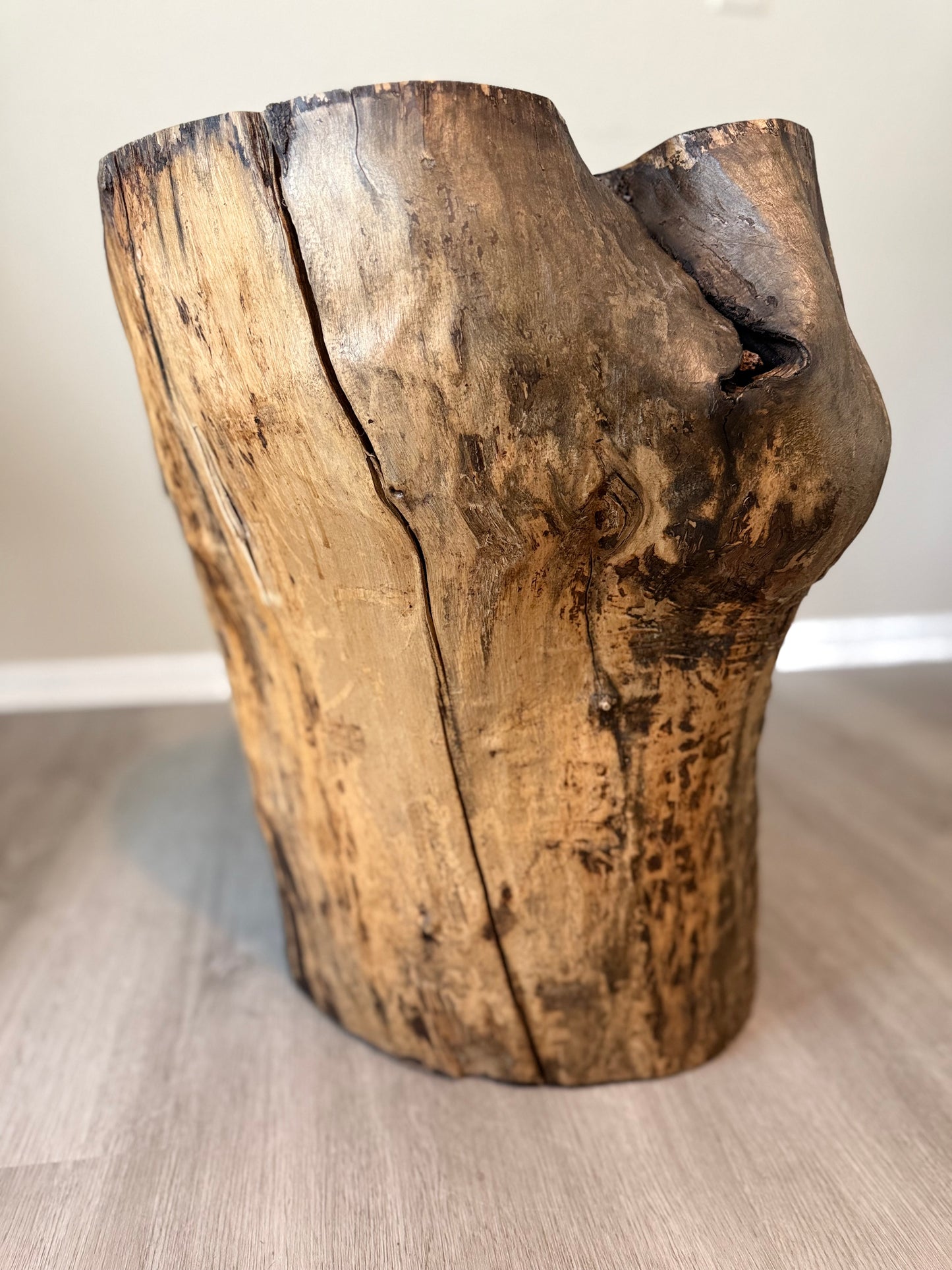 close up of natural walnut table showing natural cracks and sealed edges