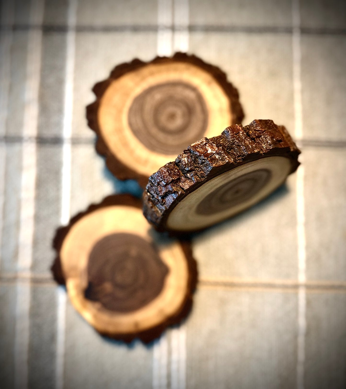 detailed shot of sealed bark edges on handmade drink coasters