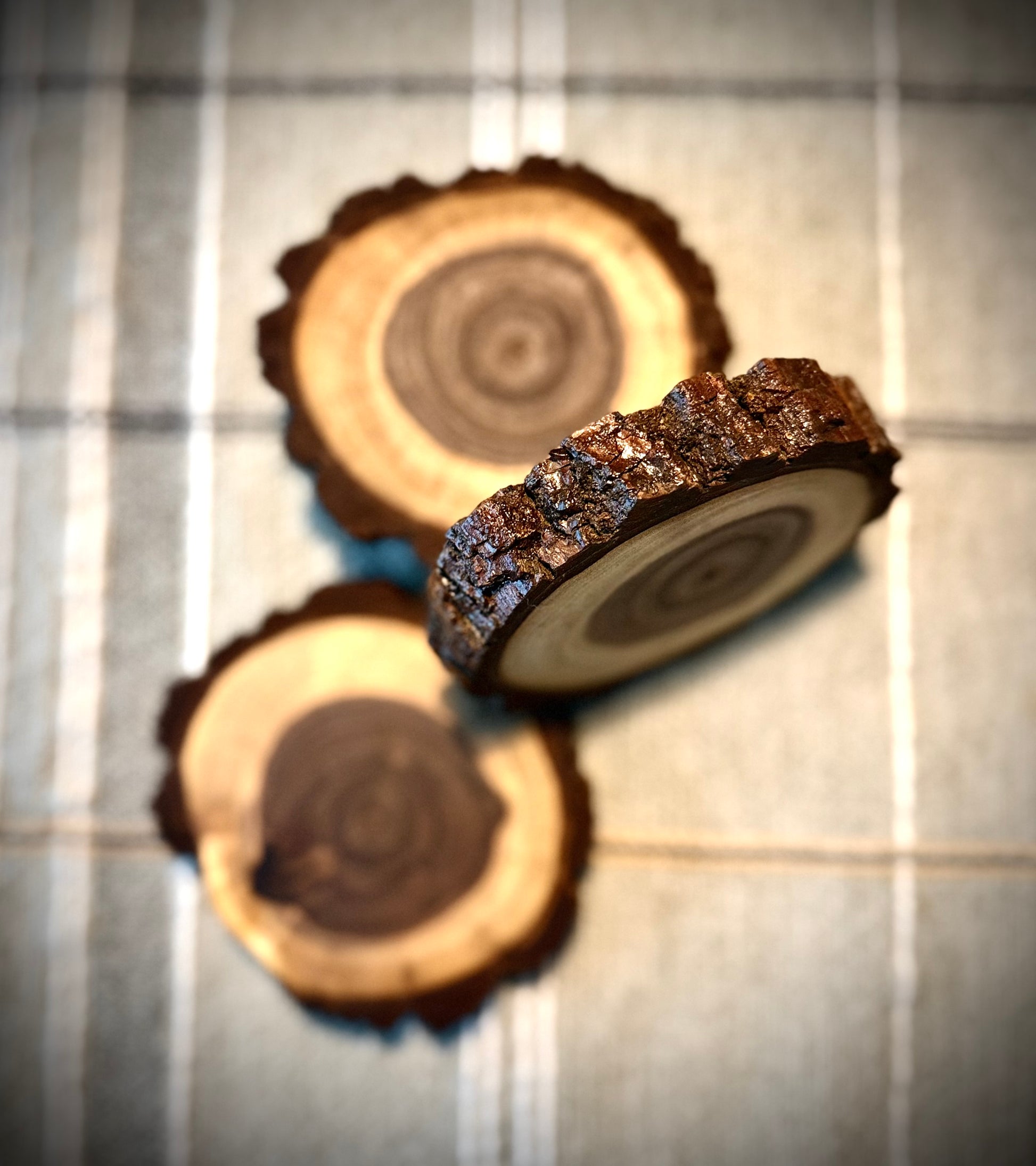 detailed shot of sealed bark edges on handmade drink coasters